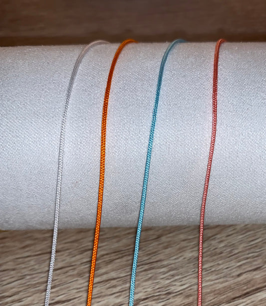 Bracelet en tissus noeuds coulissants